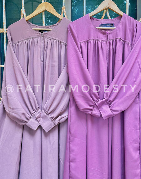 top cut body style with cuffed sleeves